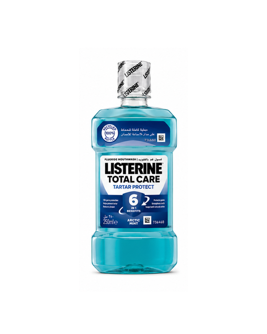 Bottle of Listerine Total Care mouthwash on a white background
